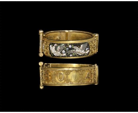 19th century AD. 
A gold hinged clasp with beaded wire borders to the outer face, granule and filigree foliage and geometric 