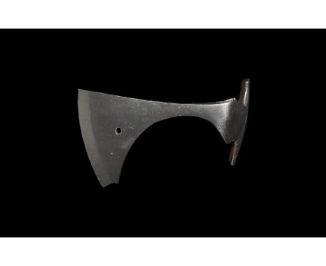 9th-11th century AD.
An iron axehead with triangular-section blade widening to a broad bevelled edge with central hole, squar