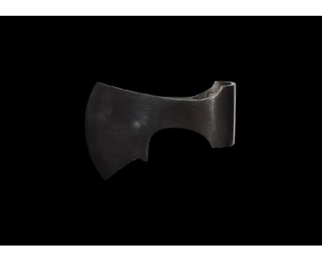 9th-11th century AD. 
An iron axehead with triangular-section blade widening to a broad bevelled edge with spur to the unders