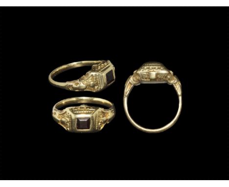 Mid-17th century AD.
A flat-section gold hoop with reserved foliage to the shoulders, box-shaped bezel with sloping sides set