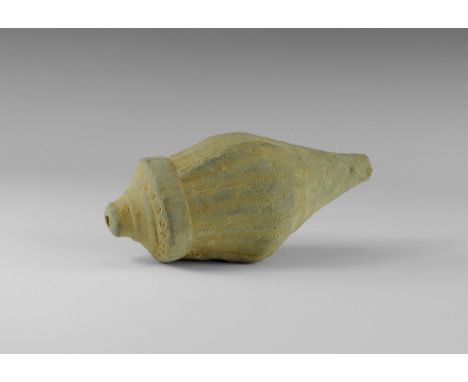 9th-11th century AD.
A hollow ceramic vessel with a thick conical nozzle, broad shoulder with band of roundels, piriform body