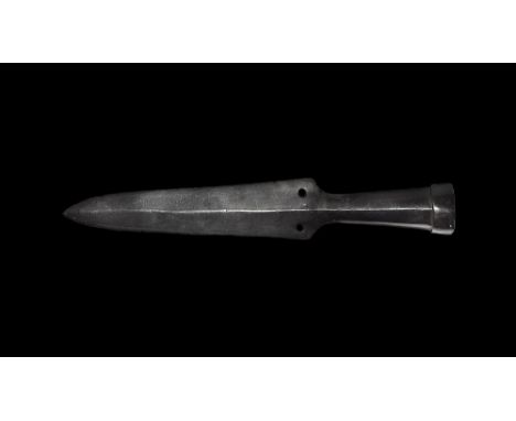 9th-11th century AD.
A substantial iron spearhead of Petersen's Type F, comprising a lentoid-section tongue-shaped blade with