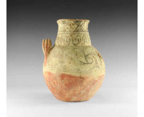 1st millennium BC. 
A ceramic jug with bulbous body, tapering tubular neck and flared mouth, one of two applied ribbed strap 