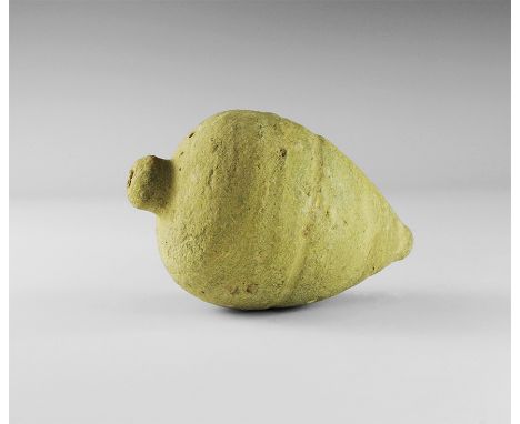 9th-11th century AD.
A hollow ceramic vessel, piriform in shape, intended to be filled with explosive liquid and a wick, and 