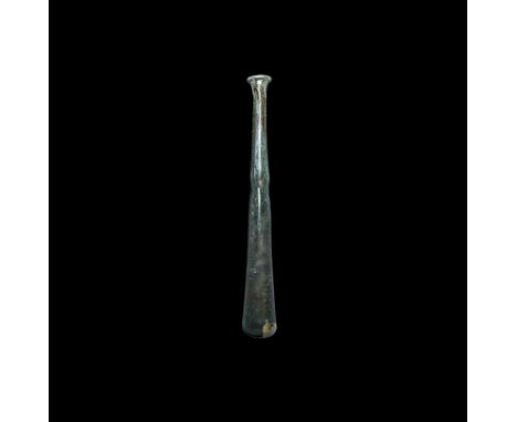 2nd-3rd century AD.
A pale blue tapering glass bottle with flat base, waisted conical neck, everted and folded rim; iridescen