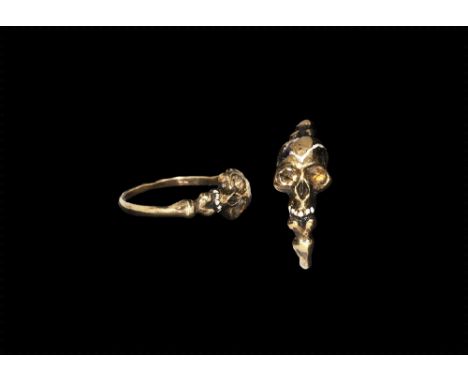 Late 17th-Early 18th century AD. 
A D-section gold hoop with shoulders formed as the upper ends of femurs flanking a skull-sh