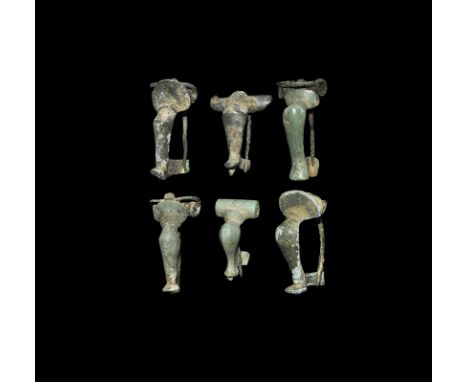 2nd century AD.
A mixed group of bronze knee brooches, one with hinged pin and transverse tubular headplate, one similar with