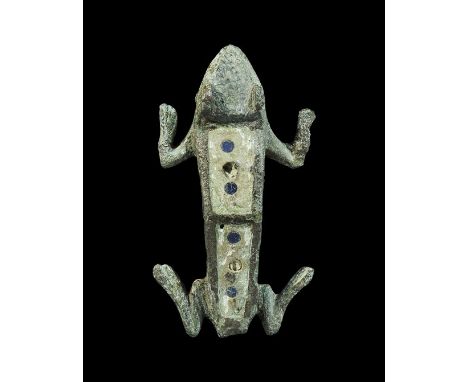 2nd century AD.
A bronze plate brooch in the form of a frog with extended legs, D-shaped lugs to the eyes, recesses to the up