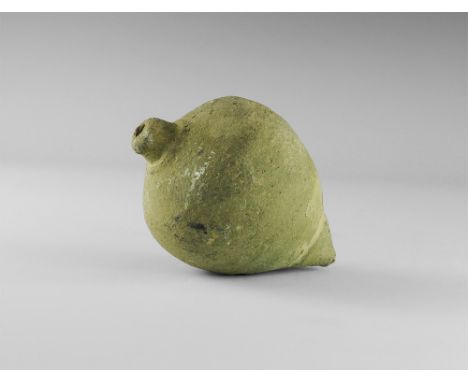 9th-11th century AD. 
A hollow ceramic vessel, piriform in profile, intended to be filled with explosive liquid and a wick, a
