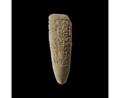 3rd millennium BC. 
A terracotta temple cone with slightly domed upper surface, vertical bands of cuneiform text to one side.