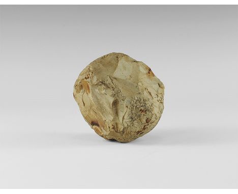 50,000-10,000 years BP.
A rounded hammer stone with flaked surfaces, inscribed 'S Piennes'. 665 grams, 87mm (3 1/2"). Fine co