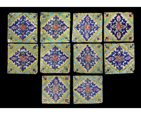 18th-early 20th century AD. 
A group of ten white-glazed square tiles, each with pale blue field, white panel with yellow ten