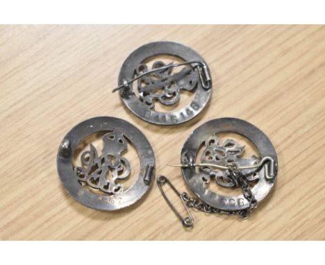WW1 Silver War Badges, three numbered SWB 320057 missing pin, B115148, B168986.   Online sources confirm these awards as foll