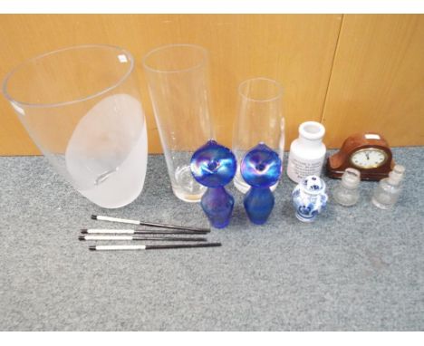 Two iridescent blue Heron glass vases, a blue and white lidded vase, two vintage fragrance bottles one marked L T Piver, Pari