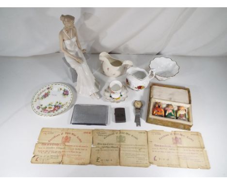 Lot to include 3 certificates of post war credit, a white metal cigarette case, a vintage Timex watch, a lighter, a quantity 