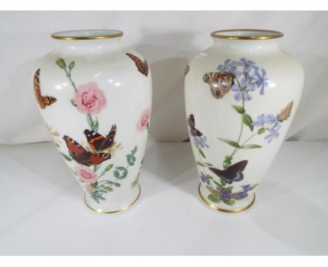 Franklin Porcelain - two Franklin Porcelain vases by John Wilkinson comprising The Country Garden Butterfly vase and The Mead