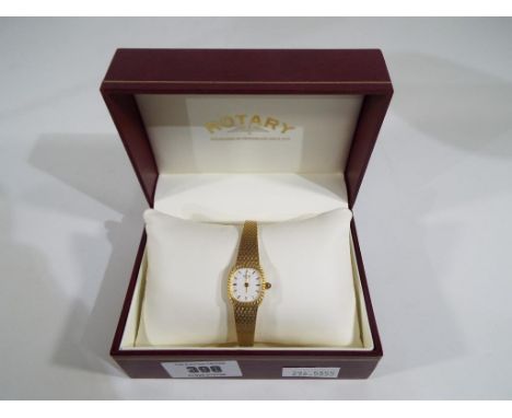 A lady's gold-plated wristwatch, close woven band, oval white dial with applied gold baton numerals, signed to the dial Rotar