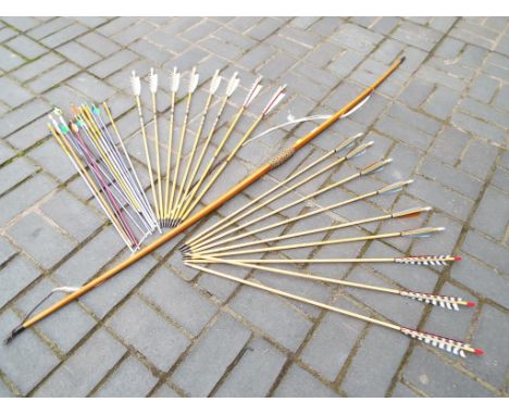 A vintage Longbow marked to the shaft 38 (draw weight) f.h. Ayres London 3 boxes of Longbow arrows both target and handmade m