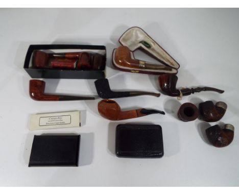 Eight pipes and a further three pipe chambers, one chamber with a mount marked 'sterling silver', another hallmarked Dublin a