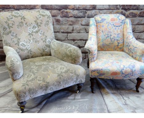 TWO VICTORIAN EASY CHAIRS, one with pink floral printed fabric, the other green and caramel velure fabric, both on ceramic ca