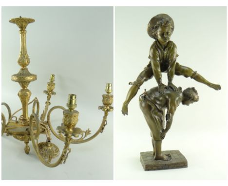 FIVE-BRANCH CEILING LIGHT AND SCULPTURE OF LEAP-FROGGING BOYS, the former of gilt metal, 58 diam x 46cms h., sculpture modern
