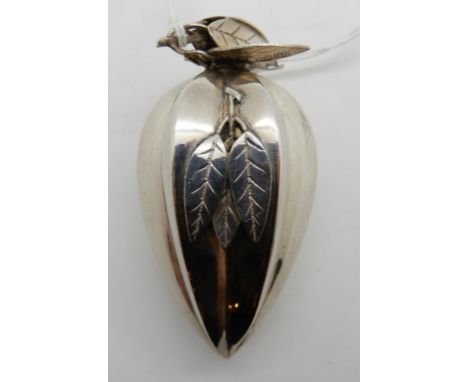 A Chinese silver fruit shaped sander modelled with detachable leaf finial above a fluted body applied with leaves, stamped ma