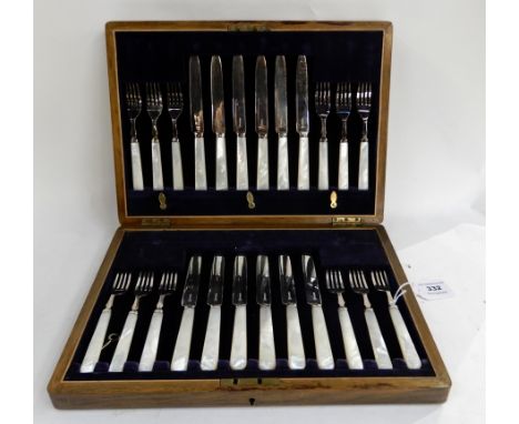 A cased twenty four piece EP and mother of pearl dessert cutlery set Condition Report: Available upon request