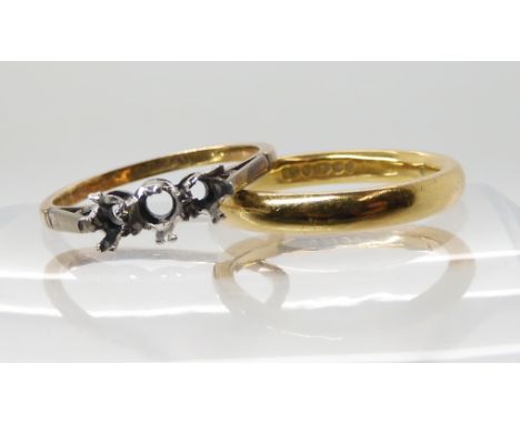 An 18ct gold court wedding ring size K1/2, together with an 18ct three stone ring blank size M, weight combined 5.8gms Condit