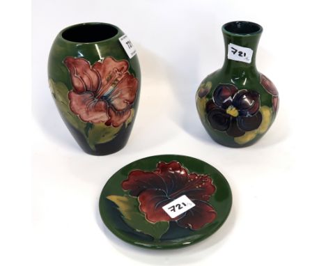 A Moorcroft pottery hibiscus pattern vase 13cm high, a pin dish and an anemone vase Condition Report: no chips or cracks, lig