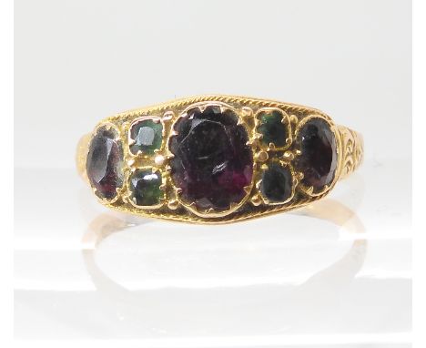 A 15ct gold gem set ring date 1899 Birmingham, size Q, weight 2.3gms Condition Report: Gems in closed back setting, chips to 