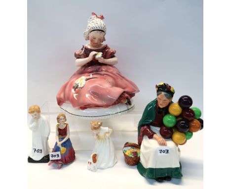 A Hertwig and Co Katzhutte figure of a sitting girl, three Doulton figures Sit, Darling and The Old Balloon Seller and a pain