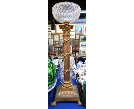 A classical column oil lamp, with twirling vine detail (no shade) Condition Report: Available upon request