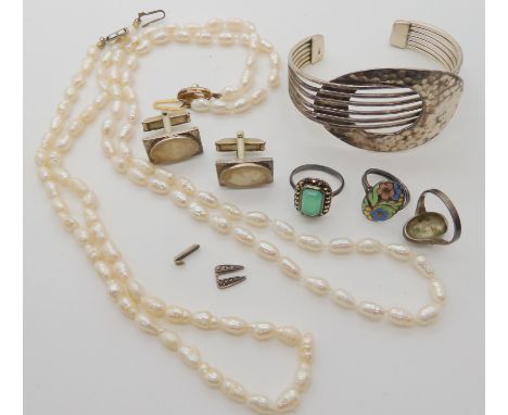 A silver bangle, an Art Deco enamelled ring and other items Condition Report: No condition report available for this lot