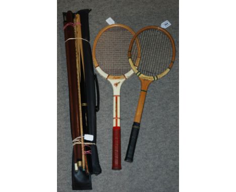 Two vintage tennis rackets and modern pool cues Condition Report: Available upon request