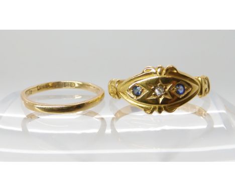 An 18ct gold wedding ring size J, together with an 18ct gold sapphire and diamond ring dated Birmingham 1900, size N, weight 