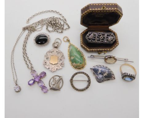 A collection of silver and white metal jewellery to include an amethyst set cross Condition Report: No condition report avail