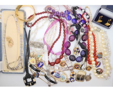 A gold plated cuff bangle and a collection of costume jewellery, ladies watches and enamel bowling medals Condition Report: N