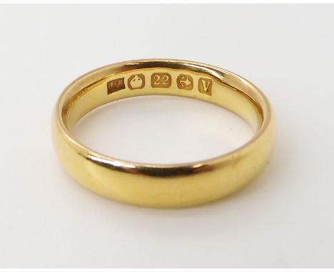 A 22ct gold wedding ring size J, weight 4.4gms Condition Report: Available upon request