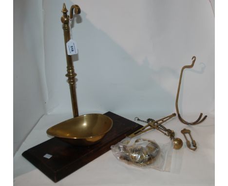 A vintage brass scale with associated weights Condition Report: Available upon request