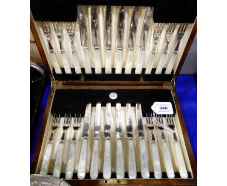 A cased twenty four piece EP and mother of pearl dessert cutlery set Condition Report: Available upon request