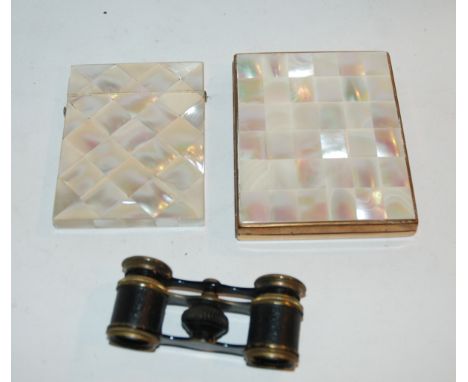 A mother of pearl card case, mother of pearl compact and opera glasses Condition Report: The card case is missing a section o