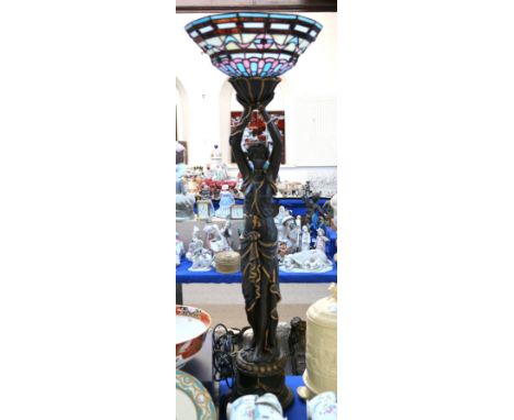 A large lady lamp with leaded glass shade Condition Report: Available upon request