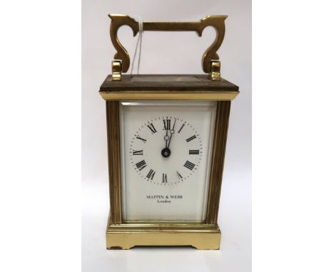A Mappin and Webb brass and glass carriage clock Condition Report: Available upon request