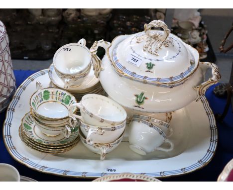 A large ceramic platter with double headed dragon motif, with matching soup tureen, cups and saucers and three Hammersley cup