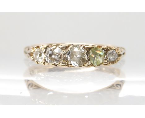 An 18ct gold five stone diamond ring (one stone missing) set with estimated approx 0.19cts of old cut diamonds as it is, size