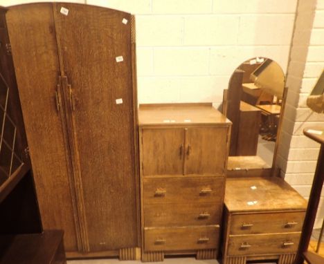Oak three piece bedroom suite comprising tallboy, wardrobe and dressing table