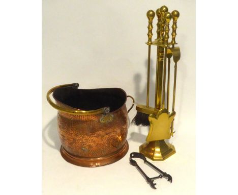 COPPER HELMET SHAPED COAL BUCKET WITH SWING HANDLE AND BRASS FIRESIDE COMPANION STAND WITH FOUR APPLIANCES 
