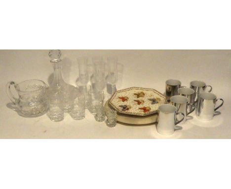 A CUT GLASS SHIPS DECANTER AND STOPPER, A CUT GLASS WATER JUG, A SET OF FIVE CUT GLASS TUMBLERS, FOUR MOULDED GLASS CHAMPAGNE
