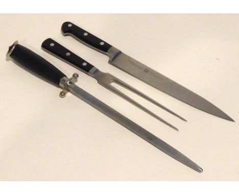 A ZWILLING J.A HENCKELS CARVING TRIO VIZ KNIFE, FORK AND SHARPENING STEEL. 