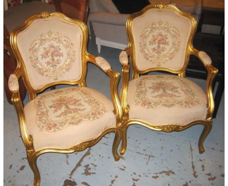 FAUTEUILS, a pair, Louis XV style with gilt show frames and tapestry style covers, 60cm W. (2)